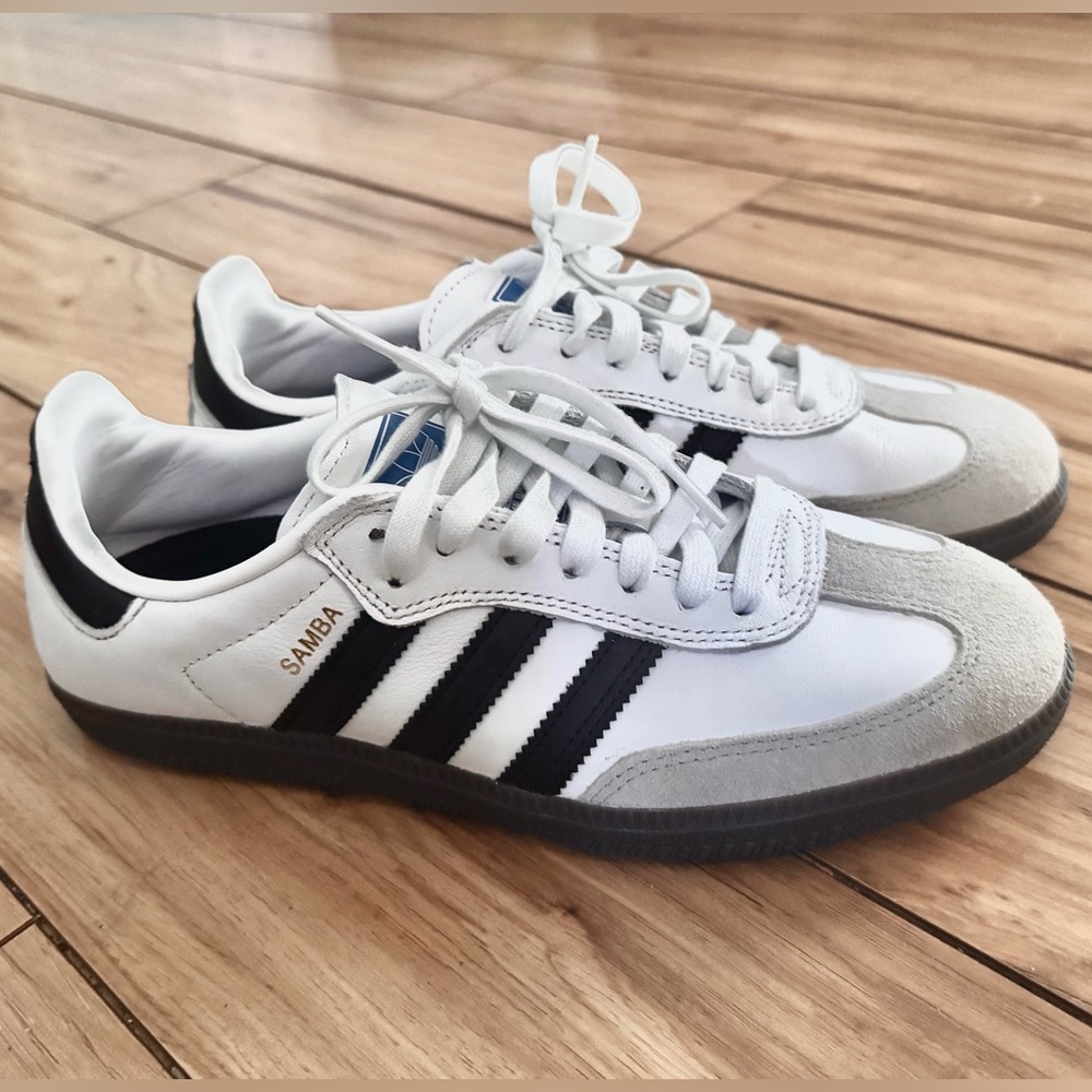 Adidas White and Black Sneakers with Iconic Stripes